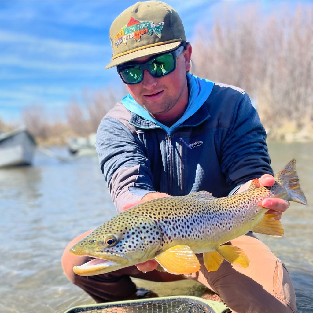 A man holding the fish he caught